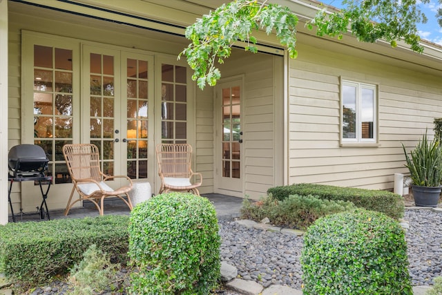 property entrance featuring french doors