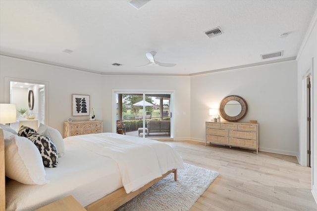 bedroom with access to exterior, ornamental molding, visible vents, and light wood-style floors