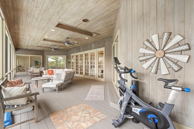 sunroom / solarium featuring wooden ceiling