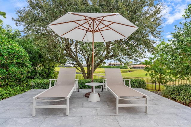 view of patio / terrace with fence