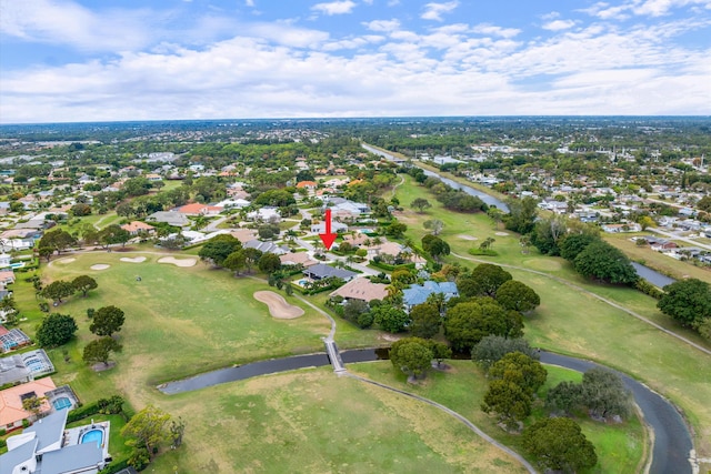 aerial view with a residential view and view of golf course