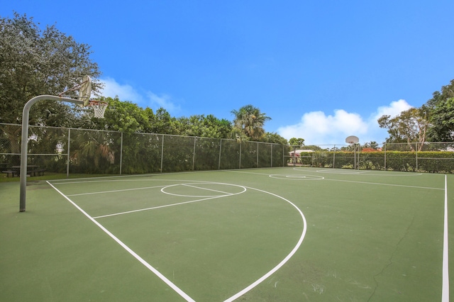 view of sport court with community basketball court and fence