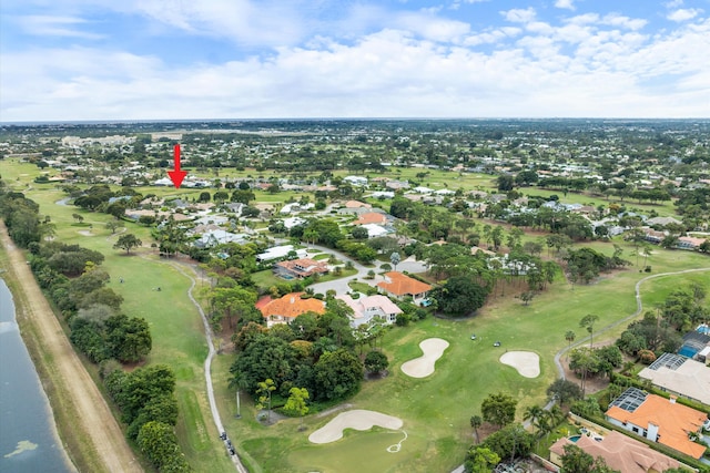 bird's eye view with a water view and golf course view