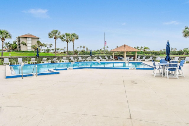 view of pool featuring a gazebo and a patio