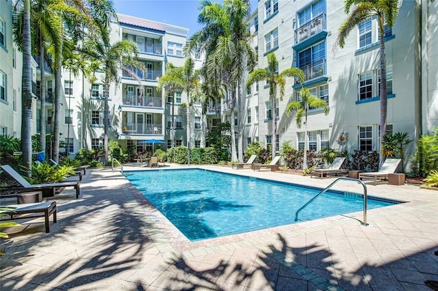 view of pool featuring a patio area