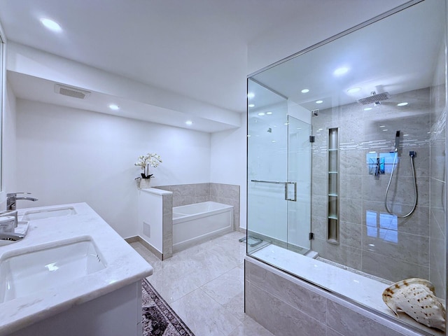 bathroom with vanity and plus walk in shower