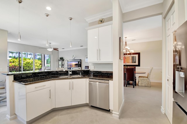 kitchen with white cabinetry, dark stone counters, hanging light fixtures, stainless steel dishwasher, and crown molding