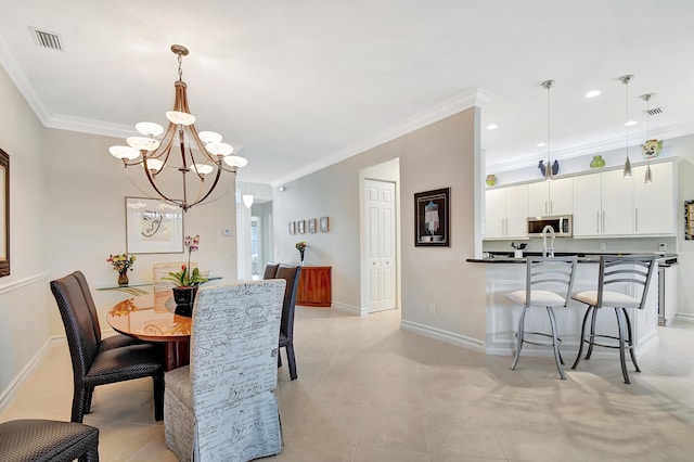 tiled dining room featuring crown molding and an inviting chandelier