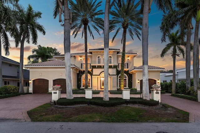 mediterranean / spanish-style house with a balcony