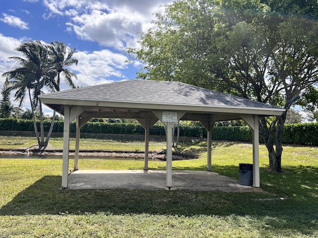 view of property's community with a gazebo and a yard