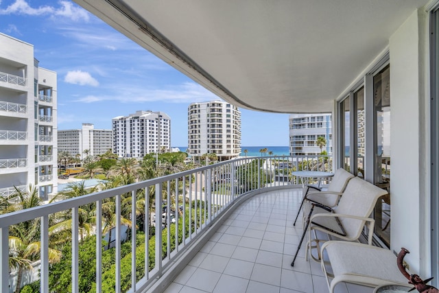 balcony featuring a water view