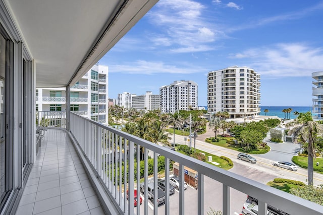 balcony featuring a water view