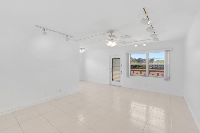 351 Preston I, Boca Raton, FL 33434 - unfurnished room featuring track lighting, a ceiling fan, and baseboards