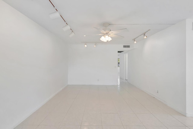 351 Preston I, Boca Raton, FL 33434 - empty room featuring track lighting, a ceiling fan, and baseboards