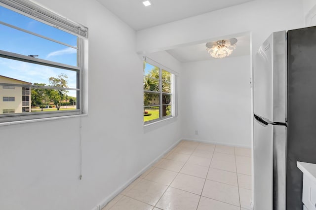 351 Preston I, Boca Raton, FL 33434 - unfurnished room with light tile patterned flooring and baseboards