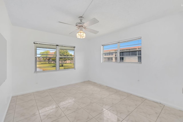 351 Preston I, Boca Raton, FL 33434 - unfurnished room with a ceiling fan and baseboards