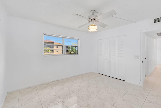 351 Preston I, Boca Raton, FL 33434 - unfurnished bedroom with a closet and a ceiling fan