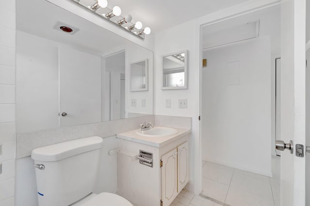 351 Preston I, Boca Raton, FL 33434 - bathroom featuring toilet, tile patterned flooring, and vanity