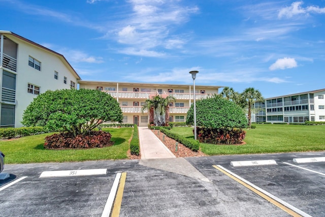 351 Preston I, Boca Raton, FL 33434 - view of property featuring uncovered parking