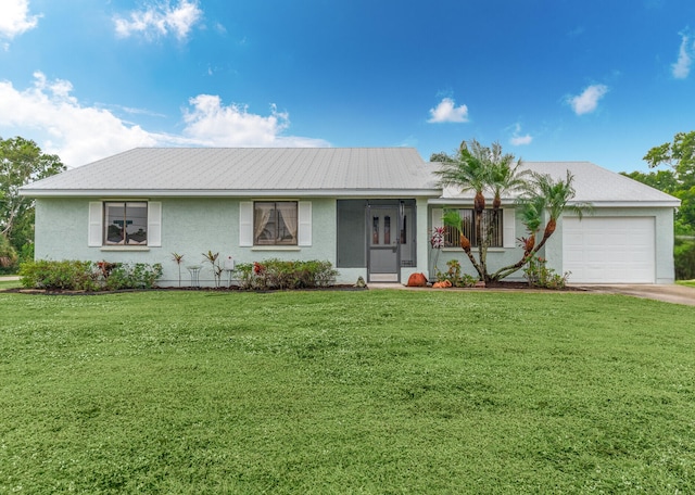 ranch-style home with a garage and a front lawn