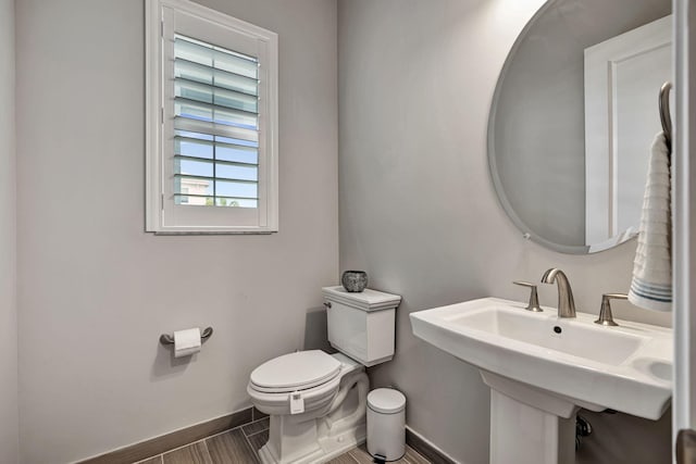 bathroom with sink and toilet