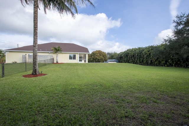 view of yard featuring fence