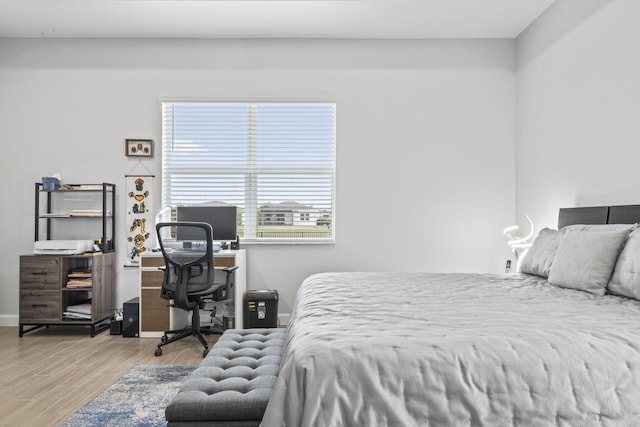 bedroom featuring hardwood / wood-style floors