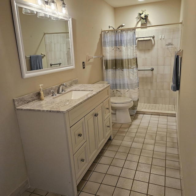 bathroom featuring vanity, tile patterned flooring, a shower with curtain, and toilet