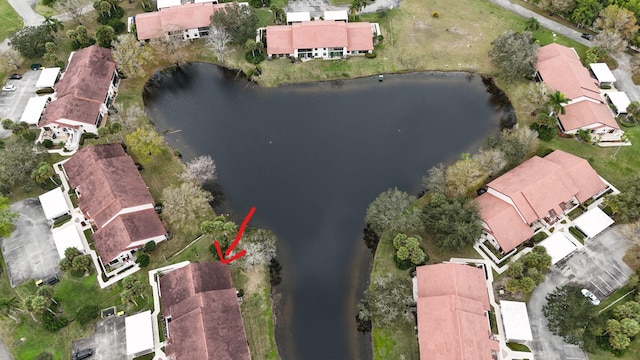 bird's eye view with a water view