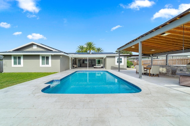 view of swimming pool featuring a patio area