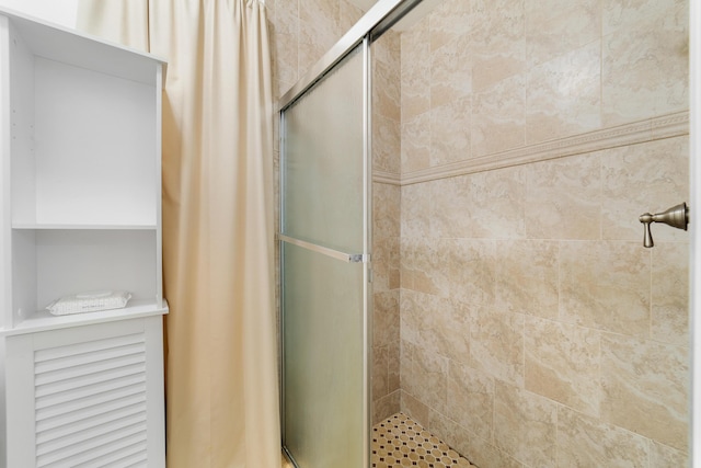 bathroom featuring walk in shower