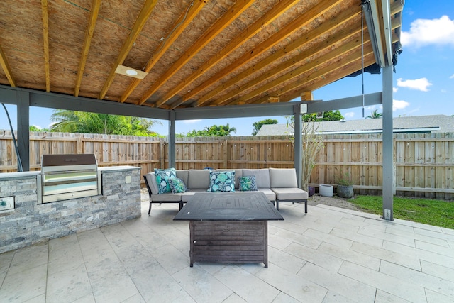 view of patio / terrace featuring outdoor lounge area and area for grilling