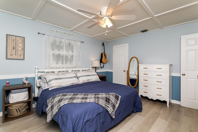 bedroom featuring light hardwood / wood-style flooring and ceiling fan