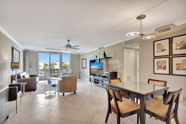 2840 S Ocean Blvd Unit 413, Palm Beach, FL 33480 - dining room with ceiling fan, crown molding, rail lighting, light tile patterned flooring, and baseboards