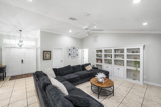 tiled living room with ceiling fan, a textured ceiling, ornamental molding, built in features, and vaulted ceiling