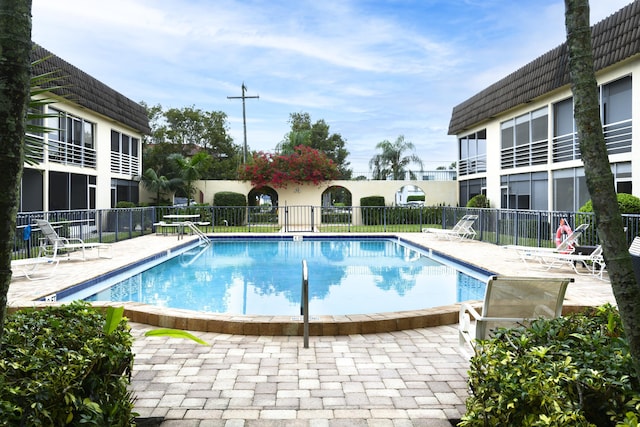 view of swimming pool featuring a patio