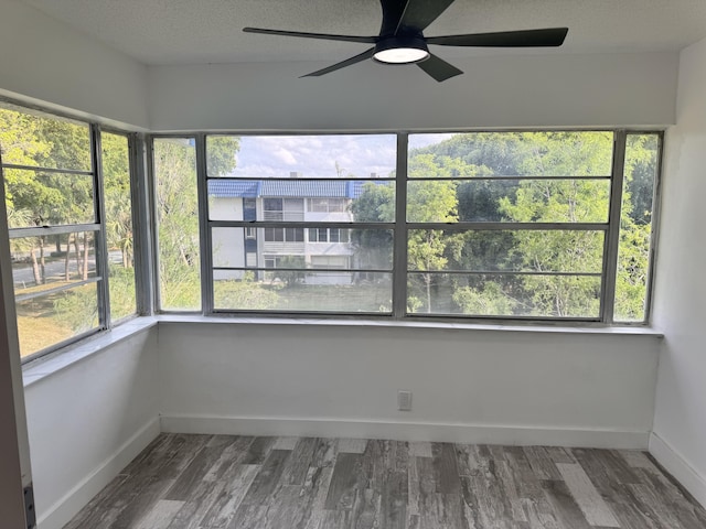 interior space featuring ceiling fan