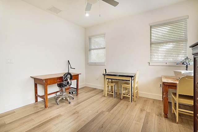 home office featuring ceiling fan and light wood-type flooring