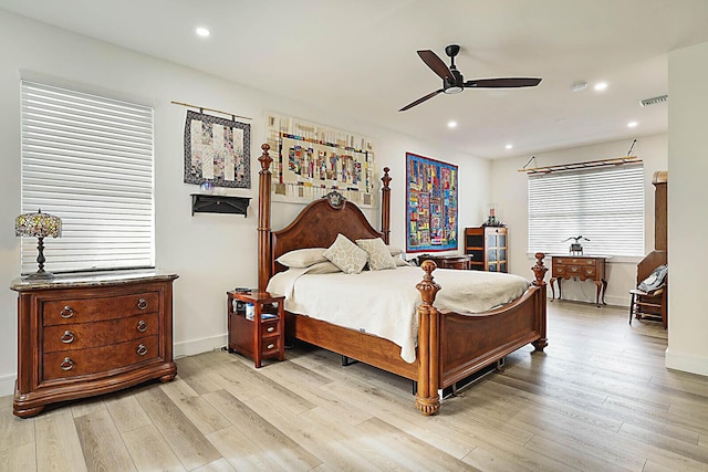 bedroom with ceiling fan, recessed lighting, light wood-type flooring, and baseboards