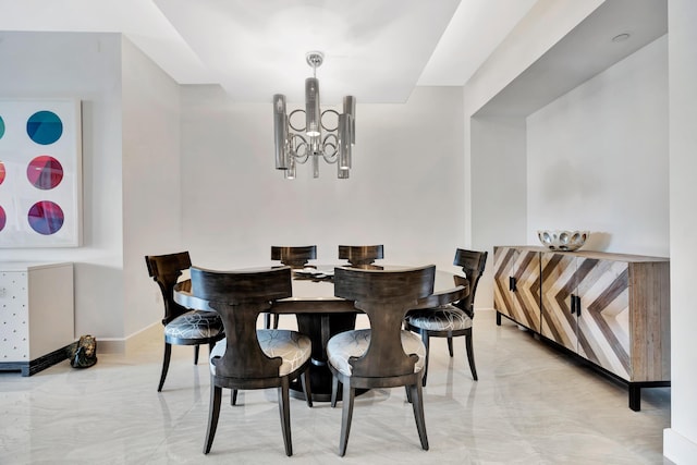 dining space with a notable chandelier