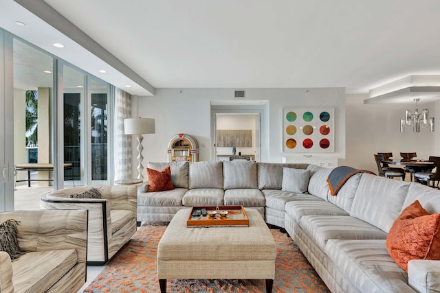 living room with a chandelier