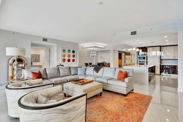 living room with a chandelier