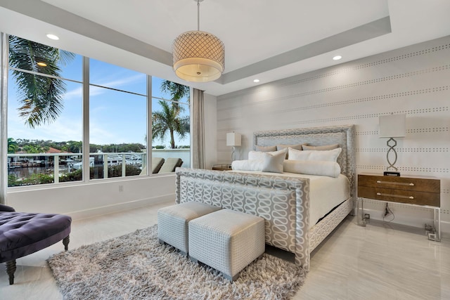 bedroom featuring a tray ceiling