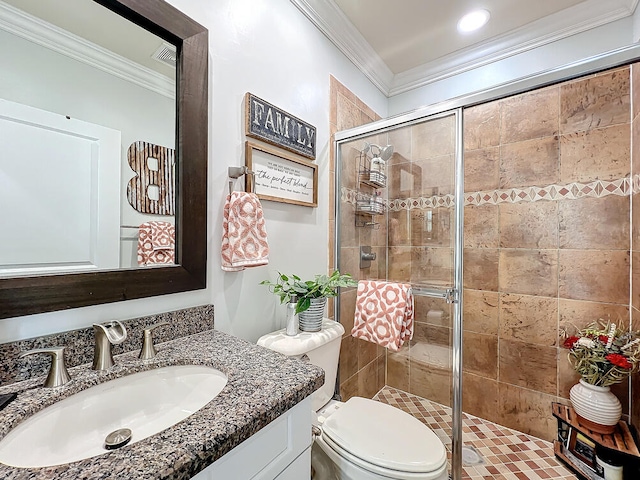 bathroom with toilet, crown molding, walk in shower, and vanity