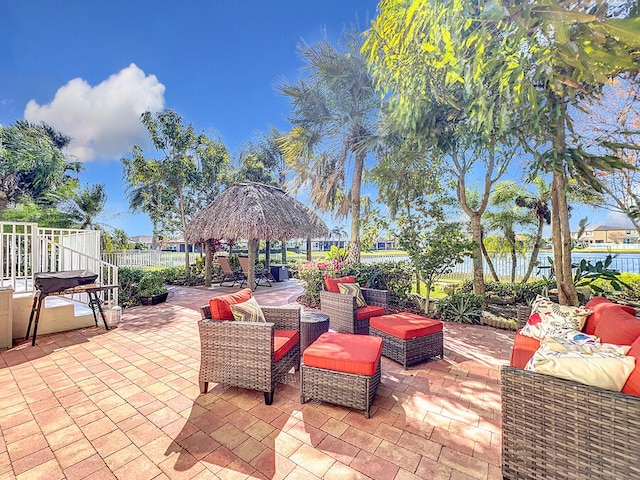 view of patio with an outdoor hangout area and a gazebo