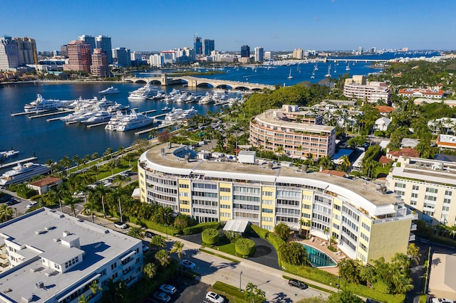 birds eye view of property with a water view