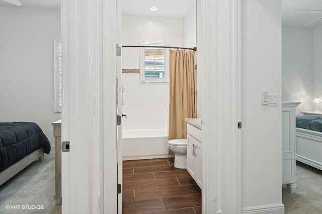 full bathroom with toilet, vanity, and shower / bathtub combination with curtain