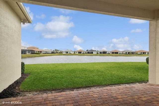 view of yard with a water view