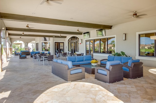 view of patio / terrace featuring ceiling fan and an outdoor hangout area