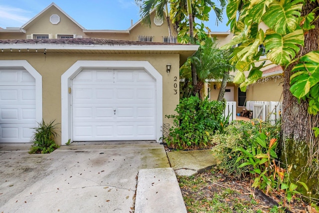 view of front of home featuring a garage